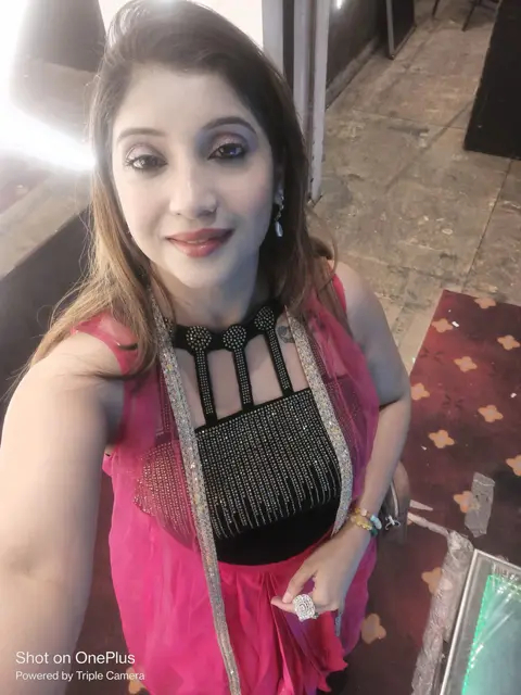 Nidhie Sonie anchoring a corporate event